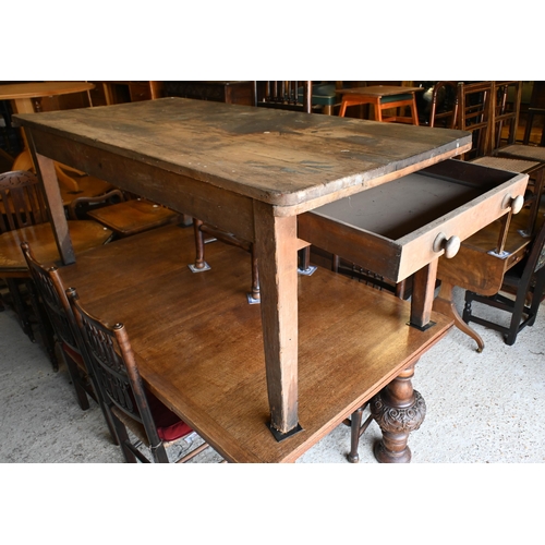 215 - A Victorian pine kitchen table, drawer to each end, 182 cm x 87 cm x 75 cm h, the surface stained an... 