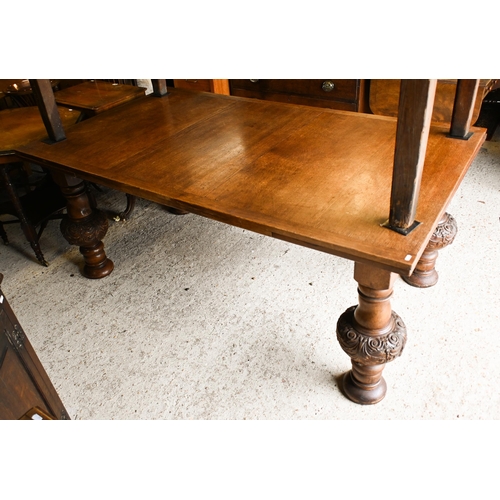 216 - A large Jacobean style oak draw leaf dining table, raised on moulded bulbous turned supports, 180 cm... 