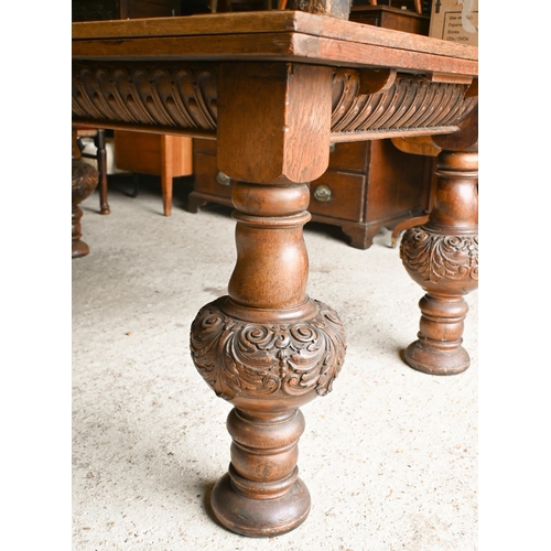 216 - A large Jacobean style oak draw leaf dining table, raised on moulded bulbous turned supports, 180 cm... 