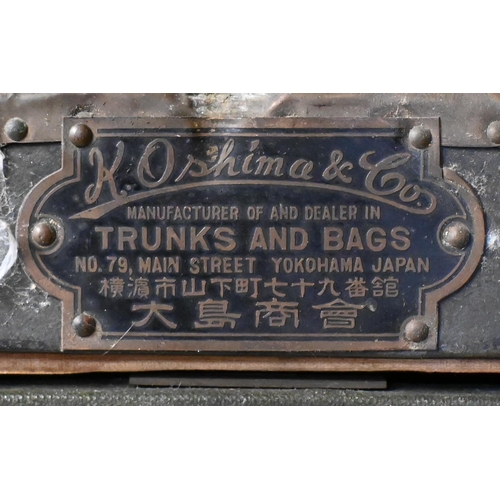 223 - K Oshima & Co. an antique fitted travel trunk complete but a/f