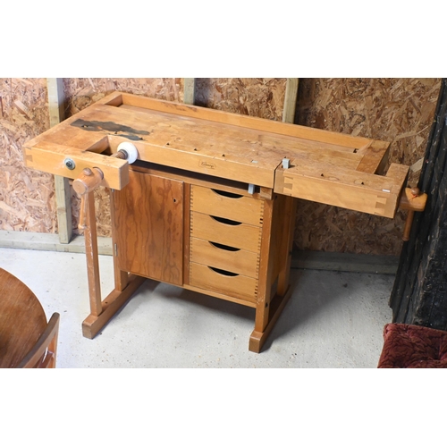 228 - Sjoberg, Sweden, a traditional wood workers work-bench, vice and clamp to each end and drawers benea... 