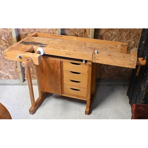 228 - Sjoberg, Sweden, a traditional wood workers work-bench, vice and clamp to each end and drawers benea... 