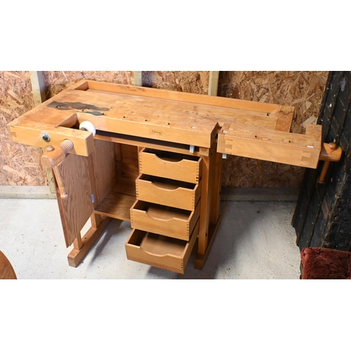 228 - Sjoberg, Sweden, a traditional wood workers work-bench, vice and clamp to each end and drawers benea... 