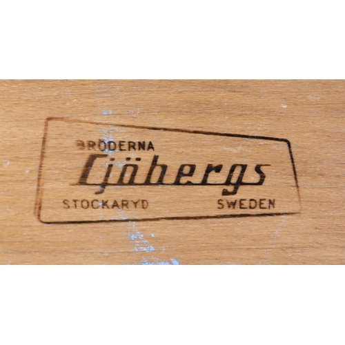 228 - Sjoberg, Sweden, a traditional wood workers work-bench, vice and clamp to each end and drawers benea... 