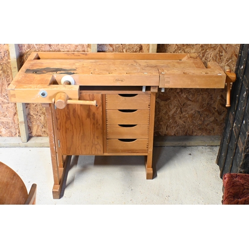 228 - Sjoberg, Sweden, a traditional wood workers work-bench, vice and clamp to each end and drawers benea... 