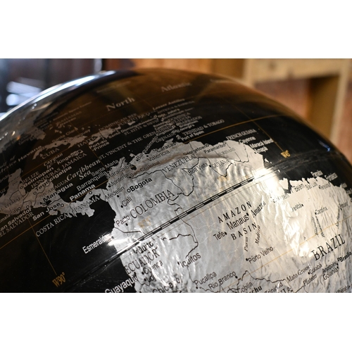 230 - A contemporary table top world globe on stand, by Tristan de Cumha Group, 40 cm dia.