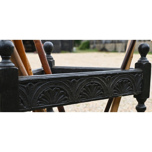 233 - A 17th century credence style stained oak corner table, to/with an oak corner stick stand and sticks... 