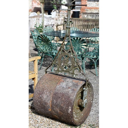 25 - # An antique cast iron garden roller