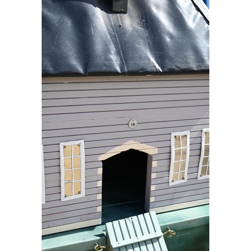 29 - A bespoke-painted wooden duck house with DPC leaded roof, 60 cm wide x 70 cm deep x 95 cm high