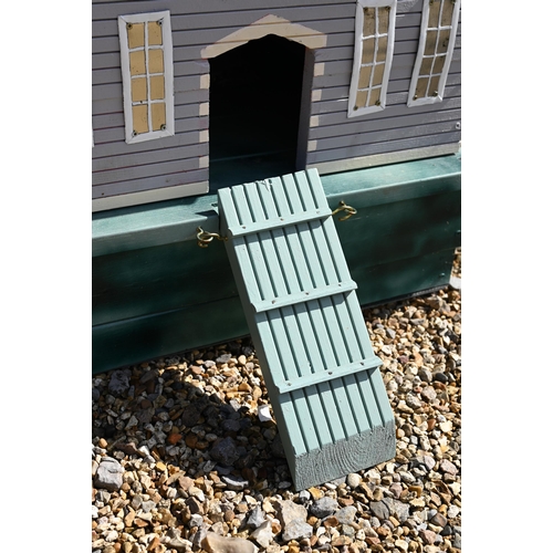 29 - A bespoke-painted wooden duck house with DPC leaded roof, 60 cm wide x 70 cm deep x 95 cm high