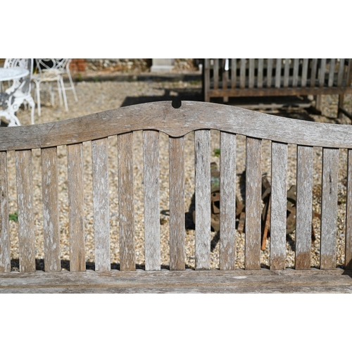 3 - A slatted teak three seater garden bench with arched back and curved seat, 160 cm wide x 70 cm deep ... 