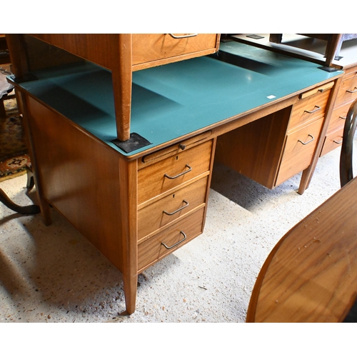 45 - A mid-century green laminate top ex-ministry kneehole desk, with an arrangement of five drawers and ... 