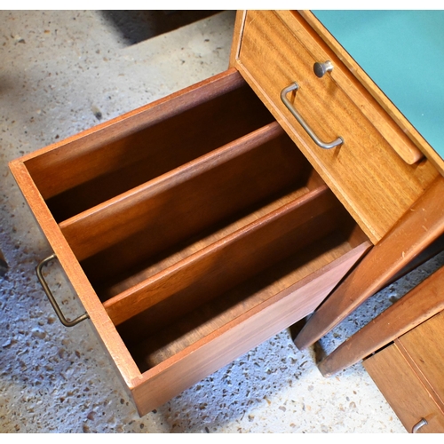 45 - A mid-century green laminate top ex-ministry kneehole desk, with an arrangement of five drawers and ... 