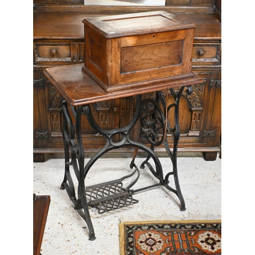 48 - # A vintage Singer treadle sewing machine table with cast iron base and machine box cover, a/f