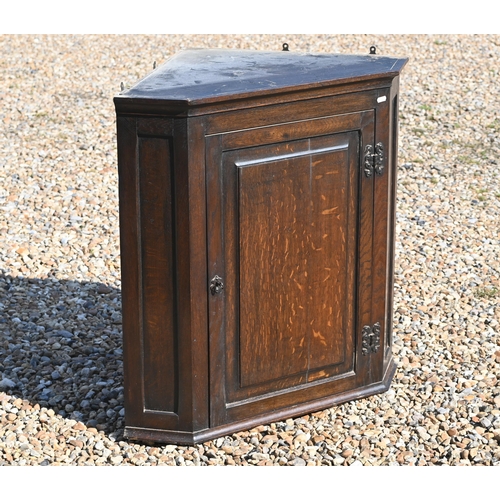 496 - # An antique oak hanging corner cupboard, 78 cm high