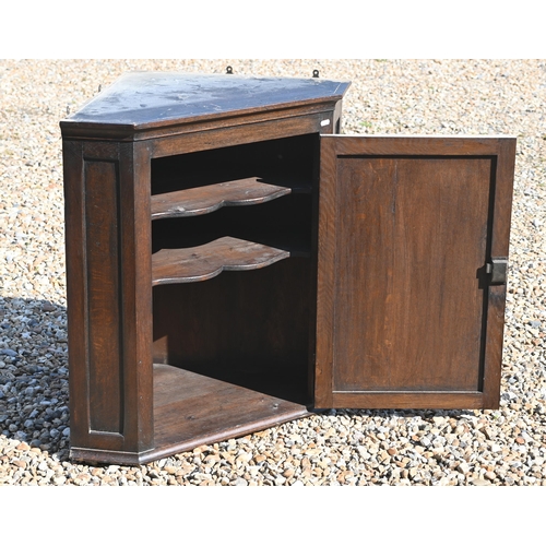 496 - # An antique oak hanging corner cupboard, 78 cm high