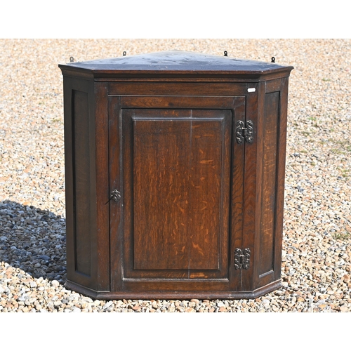 496 - # An antique oak hanging corner cupboard, 78 cm high