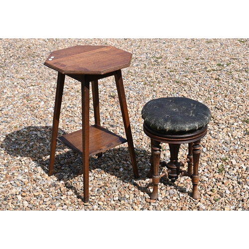 497 - A Victorian revolving piano stool to/w an octagonal oak occasional table (2)