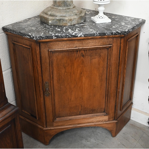 499 - # A French marble top corner cabinet with panelled cupboard door, 80 cm wide x 70 cm h, to/w a Chine... 