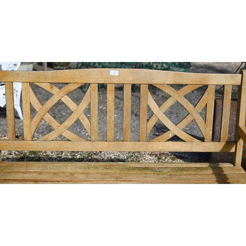 5 - A slatted teak two seater garden bench, 116 x 60 x 90 cm 