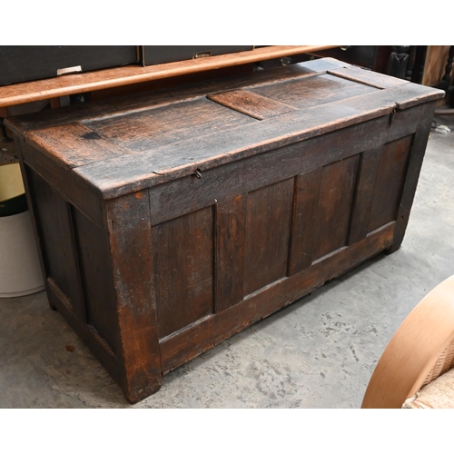 501 - An antique oak coffer, panelled construction, the front carved with thistles, 122 x 52 x 60 cm high,... 