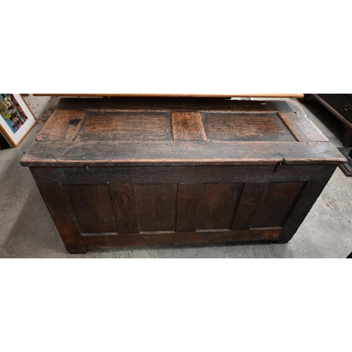 501 - An antique oak coffer, panelled construction, the front carved with thistles, 122 x 52 x 60 cm high,... 