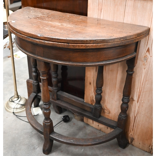 502 - Antique oak demi-lune tea table with hinged folding top, gate-leg support and turned legs, 76 x 38 x... 