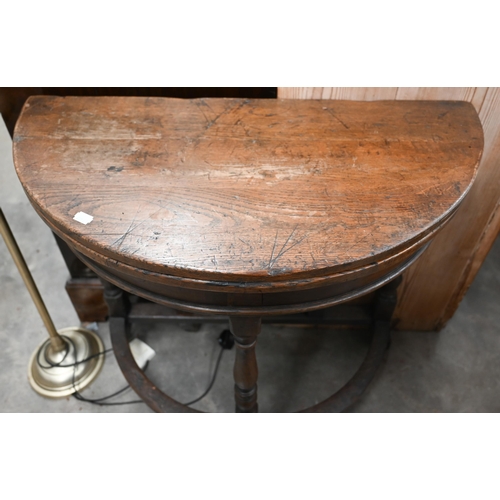 502 - Antique oak demi-lune tea table with hinged folding top, gate-leg support and turned legs, 76 x 38 x... 