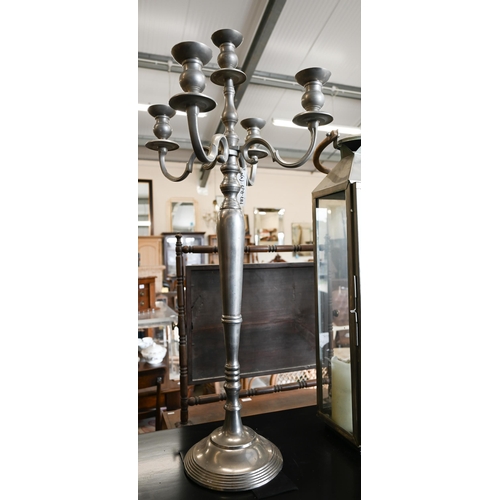 508 - Three floor standing lanterns (one missing glass panel) and a tall five-branch candelabra, 100 cm hi... 