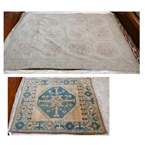 513 - # A faded Aubusson floral rug, 187 cm x 130 cm to/w a Turkish Milas blue and terracotta rug, 124 cm ... 