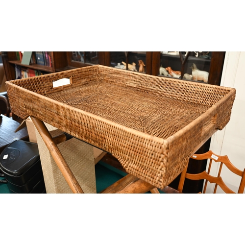 528 - A wicker butler's tray on folding stand, to/w a woven grass pedestal (2)