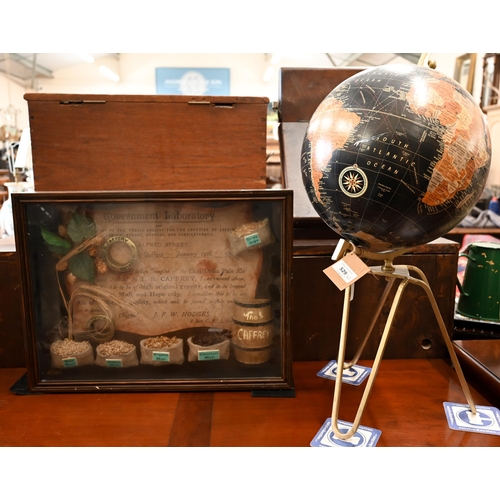 529 - A modern Globe on metal stand, to/w a miniature display of brewer's malts and hops, in glazed case (... 