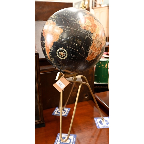 529 - A modern Globe on metal stand, to/w a miniature display of brewer's malts and hops, in glazed case (... 