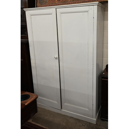 54 - #A white painted pine two door hall cupboard, 118 x 42 x 170 cm high