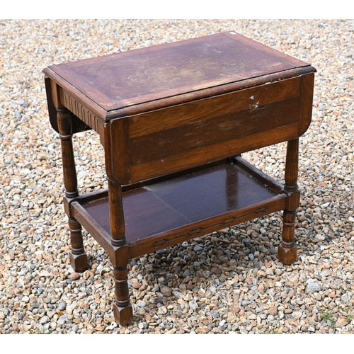 542 - # A carved  oak drop leaf side table with galleried undertier, 65 cm x 43 cm x 67 cm h