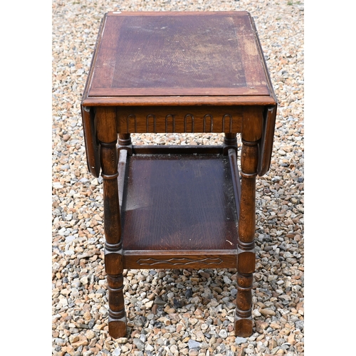 542 - # A carved  oak drop leaf side table with galleried undertier, 65 cm x 43 cm x 67 cm h