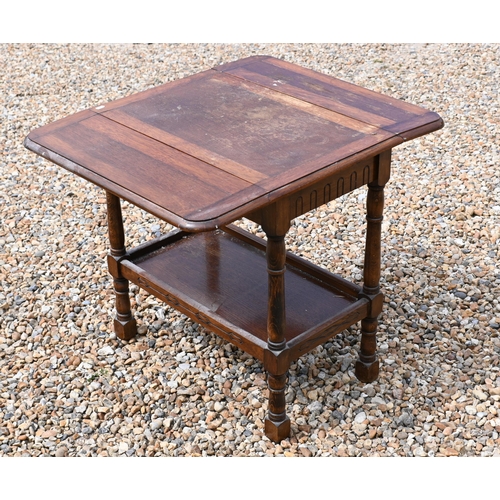 542 - # A carved  oak drop leaf side table with galleried undertier, 65 cm x 43 cm x 67 cm h