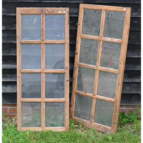 543 - Two reclaimed pine sash window frames, 116 cm x 49 cm to/w a pair of reclaimed louvred shutter panel... 