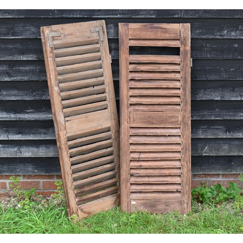 543 - Two reclaimed pine sash window frames, 116 cm x 49 cm to/w a pair of reclaimed louvred shutter panel... 