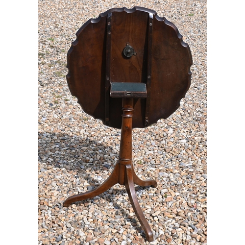 544 - A reproduction piecrust tilt-top tripod table, 52 cm dia. x 61 cm h