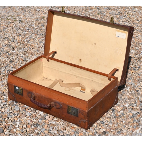 558 - John Pound & Co Ltd, a vintage tan leather suitcase