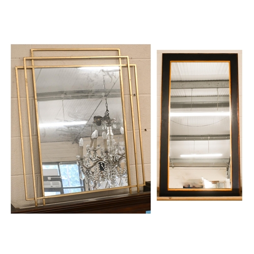 566 - A large modern wall mirror in gilded and painted frame, 150 cm x 80 cm to/w another modern gilt fram... 