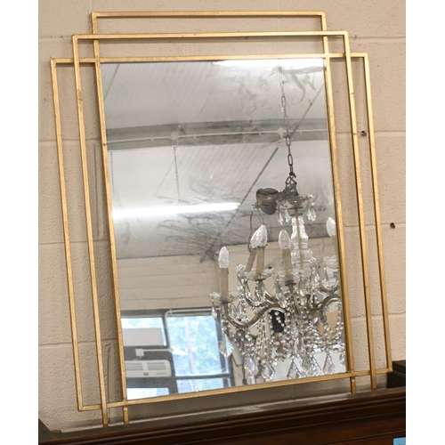 566 - A large modern wall mirror in gilded and painted frame, 150 cm x 80 cm to/w another modern gilt fram... 