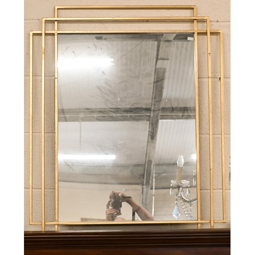 566 - A large modern wall mirror in gilded and painted frame, 150 cm x 80 cm to/w another modern gilt fram... 