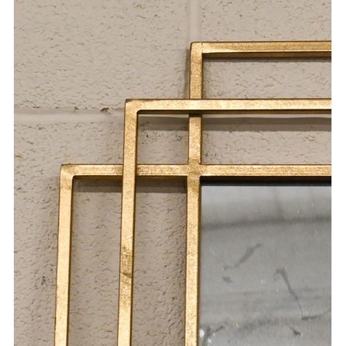 566 - A large modern wall mirror in gilded and painted frame, 150 cm x 80 cm to/w another modern gilt fram... 