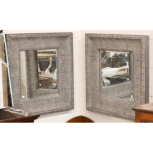 568 - Pair of wall mirrors, bevelled glass and embossed grey painted metal frames, 69 x 69 cm to/w two lar... 