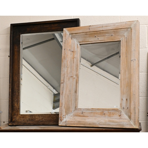 569 - Two bevelled mirrors with limed and stained antiqued frames, 81 cm x 72 cm and 100 cm x 70 cm to/w a... 