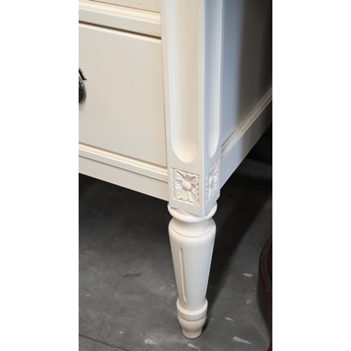 69 - French style cream painted chest of four long drawers on turned supports, 84 x 44 x 98 cm high