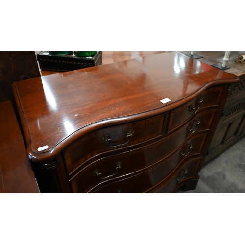 72 - A good quality Georgian style mahogany serpentine front chest of two short over three long drawers, ... 