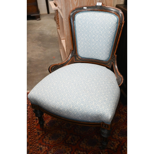 83 - Victorian Aesthetic movement burr walnut and ebonized nursing chair with paisley upholstery